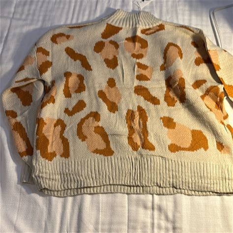 Angashion Women's Long Sleeve Leopard Print Knitted Sweater